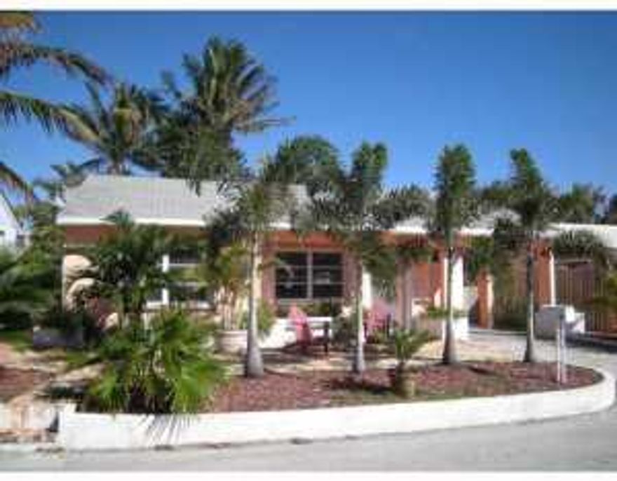 EAST OF A1A-2BDRM/2BATH BEACH COTTAGE. S/F HOME  WAS UPDATED WITH NEW KITCHEN, GAS STOVE,OPEN CEILINGS, NEW BATHS, WASHER, DRYER, ACCORDION SHUTTERS ON ALL WINDOWS AND DOORS, TILE FLOORS. GREAT FENCED BACK PATIO WITH TROPICAL LANDSCAPING.  CHICAGO BRICKS ALL AROUND.  CASUAL BEACH NEIGHBORHOOD.