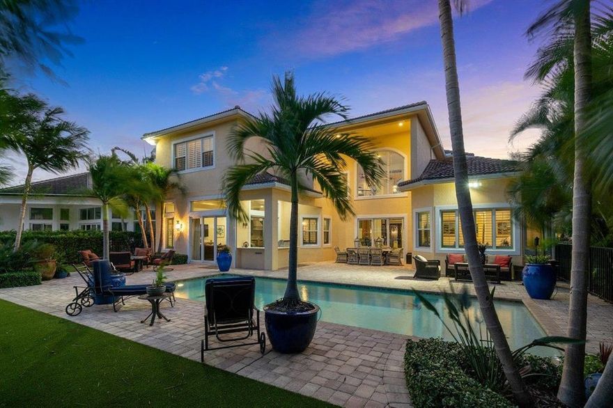 Stunning 6BR estate w/4814 SF living, 70' waterfront, minutes to Intracoastal, no fixed bridges. Gracious 2 story entry w/custom front doors, floor to ceiling natural light. Built 2013, top of the line finishes, impact glass throughout, gourmet kitchen w/SubZero & Wolf appliances, beautiful wood floors in main living areas, downstairs master suite w/bay window w/custom built-in bench, & spacious marble master bath, 2 large walk-in closets.  Custom office, downstairs guest suite. Spacious upstairs living area, 4 additional guest suites, storage room. A back yard oasis w/Easterly exposure, private pool, summer kitchen, artificial turf, dock w/16,000lb lift on deep water, ocean access w/ no fixed bridges,  3 car garage w/epoxy floor.  Gated enclave located between Palm Beach & Jupiter Inlet.