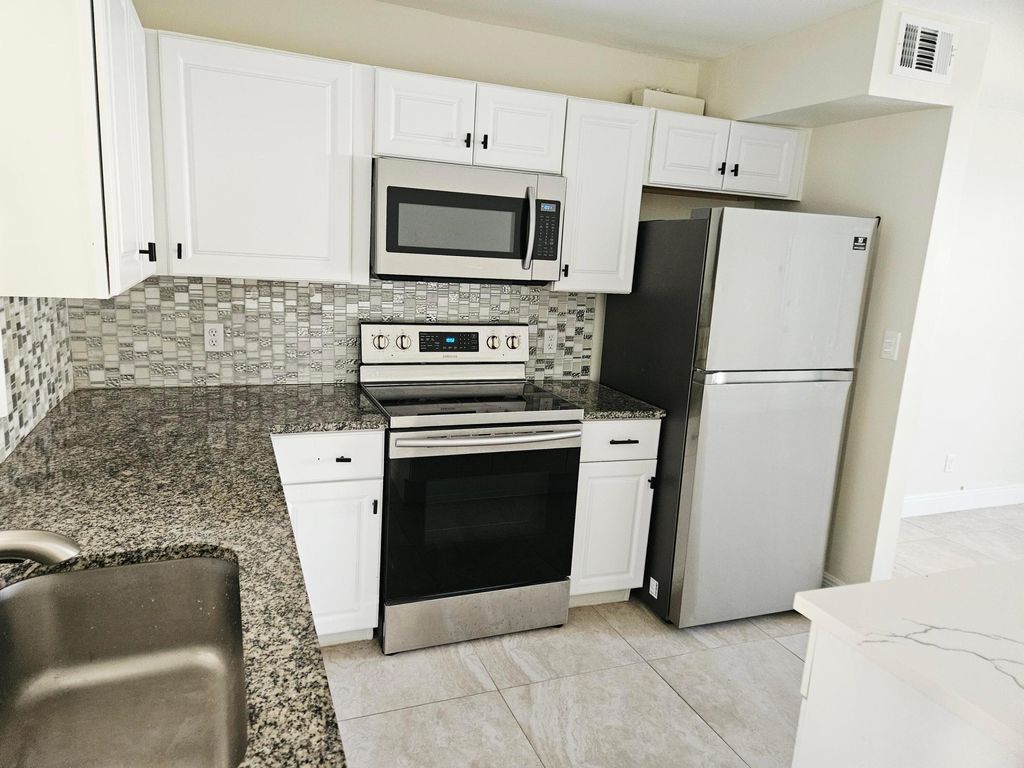 Photo of 5894 Longbow Lane #1, West Palm Beach, FL 33415 (MLS # R11144926)