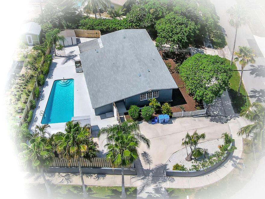 Less than 2 miles from the beach! This GORGEOUS updated pool home is situated on a corner lot & features a large circular driveway with plenty of extra parking. The open floor plan offers 3 bedrooms, 2 full baths, living room, family room, PLUS a bonus room! No HOA, so bring your RV & boat! Features include a new roof in 2022, electrical panel & pool resurfaced in 2023 and landscaping updated, new wood-look laminate flooring, new economical gas water heater, newer AC unit, newer SS appliances that includes the washer/dryer, granite counters, pantry storage, new sliding barn doors in the family room, even a nest thermostat and extensive lawn revitalization has also been done, and there’s even a delicious mango tree! With plenty of dining and shopping nearby, hurry!