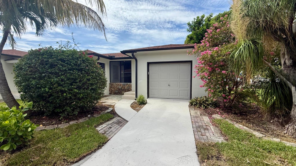Photo of 1130 N K Street, Lake Worth Beach, FL 33460 (MLS # B26044387)