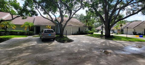 Photo of 701 Bannock Lane, Palm Beach Gardens, FL 33418 (MLS # B26015176)
