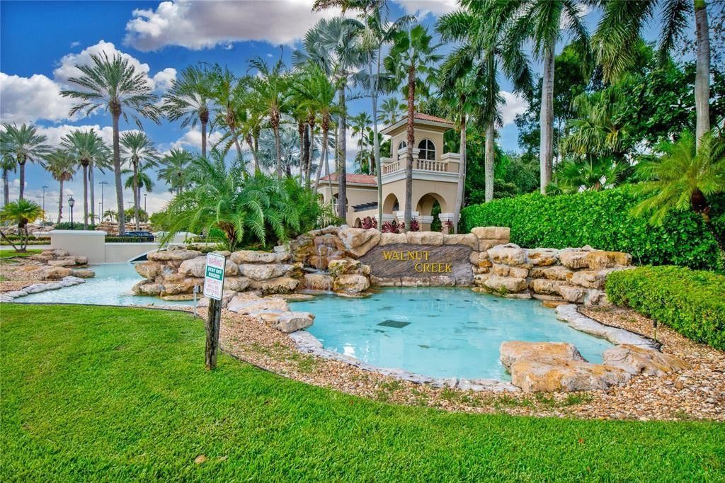 Photo of 1858 NW 74th Way, Pembroke Pines, FL 33024 (MLS # F10544333)