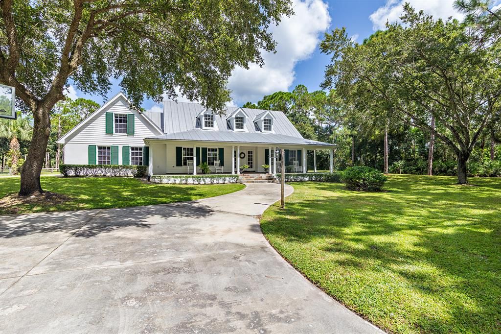 Photo of 14102 Micosukee Trail Trl, Palm Beach Gardens, FL 33418 (MLS # R10823210)