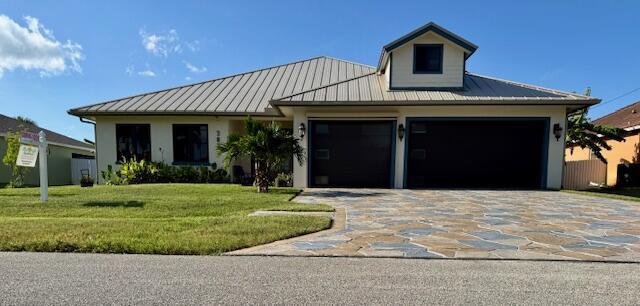 Rare home with Luxury Finishes & 6-Car GarageDiscover this one-of-a-kind custom-built pool home nestled in a sought-after Port Saint Lucie neighborhood spanning 2,640 sq ft under air... plus a 1500 sq ft 3 door garage ideal for collectors, boats, or future in-law conversion, a 1860 sq ft screened Lanai and 430 sq ft patio. This residence is a perfect fusion of luxury, function, and thoughtful design--ideal for those who crave space, elegance, and lifestyle flexibility.Step inside to an open-concept, split-bedroom floor plan filled with natural light and soaring 10' ceilings. The expansive chef's kitchen is a showstopper--featuring a massive Cambria quartz island, custom cabinetry, mosaic tile backsplash, stainless steel appliances, and a 6'x12' walk-in pantry. Just off the kitchen,