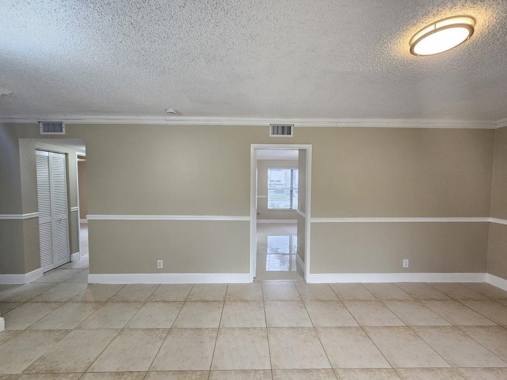 Photo of 1421 WINDORAH Way #A, West Palm Beach, FL 33411 (MLS # B26080415)