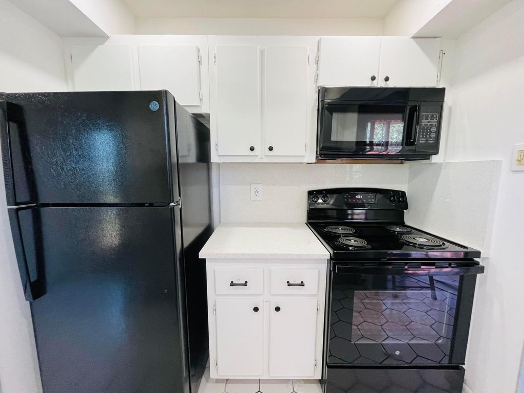 Photo of 11 Golfs Edge E #E, West Palm Beach, FL 33417 (MLS # B26026724)