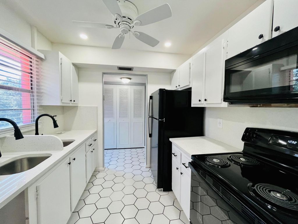 Photo of 11 Golfs Edge E #E, West Palm Beach, FL 33417 (MLS # B26026724)
