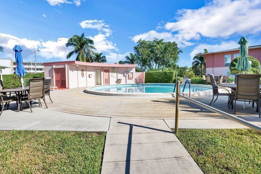 TURNKEY!! UPDATED 2 BED/2BATH SECOND FLOOR CONDO. WITH LOTS OF PRIVACY. ALL NEW KITCHEN WITH 2 SINKS ,QUARTZ COUNTERTOPS. SPOT LIGHTS,NEW APPLIANCES CENTRAL AIR, NICELY FURNISHED, WASHER/DRYER HOOK-UP VERY CLOSE TO WALGREENS AND THE CLUBHOUSE. Roomy closets (one walk-in), assigned parking spot plus visitor parking available; local bus for errands/shopping both within & outside the Village;  WASHER AND DRYER ARE ALLOWED IN THE UNIT OR YOU COULD CHOOSE TO USE  ONE OF THE ASSOCIATIONS LAUNDRY ROOMS.   THE ROOF IS NEW.  WATER IS INCLUDED IN THE MONTHLY FEE. GOLFS EDGE HAS A PRIVATE POOL FOR THEIR RESIDENTS. COME AND ENJOY RESORT STYLE LIVING IN THIS GATED COMMUNITY FOR ACTIVE ADULTS 55+. CLUBHOUSE features a theater, indoor pool, card room, community/party room, billiard room ,shuffle board ,t wo outdoor pools. Numerous heated outdoor pools throughout the community. Separate fitness center with gym , outdoor heated pool and a resistance pool. Two guarded gates and 24 hour roving security patrol. GREAT LOCATION: close to shops, restaurants, PBI airport and beaches.