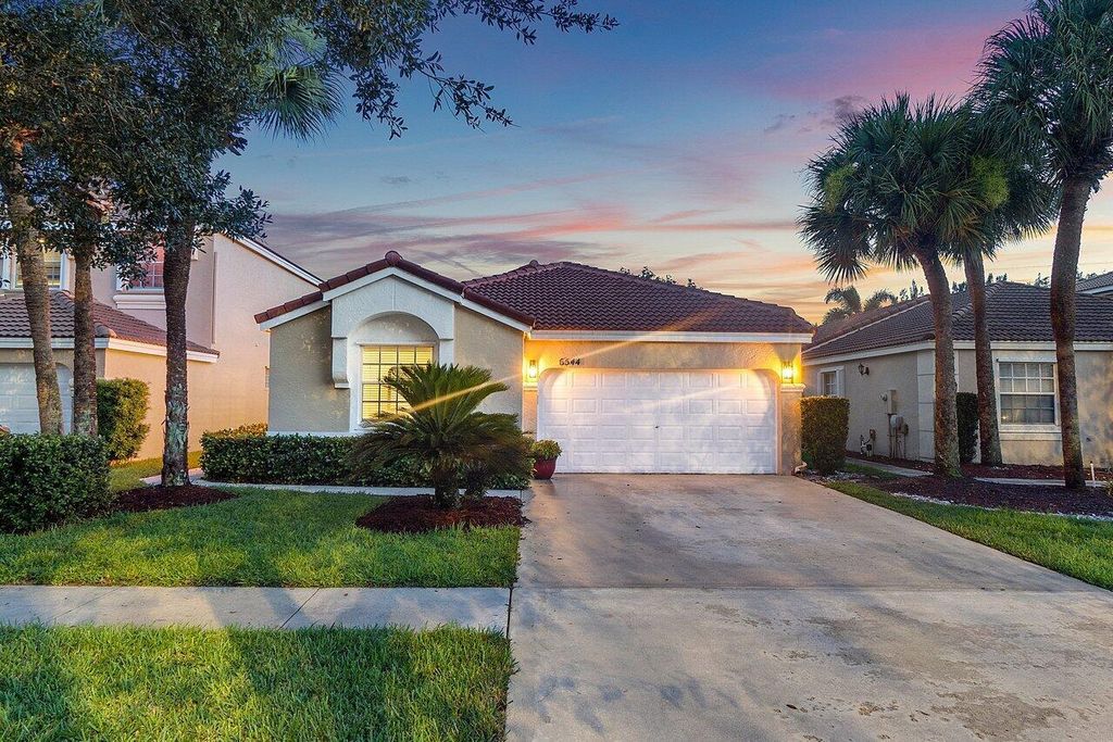 Photo of 6544 Columbia Avenue, Lake Worth, FL 33467 (MLS # R10904450)