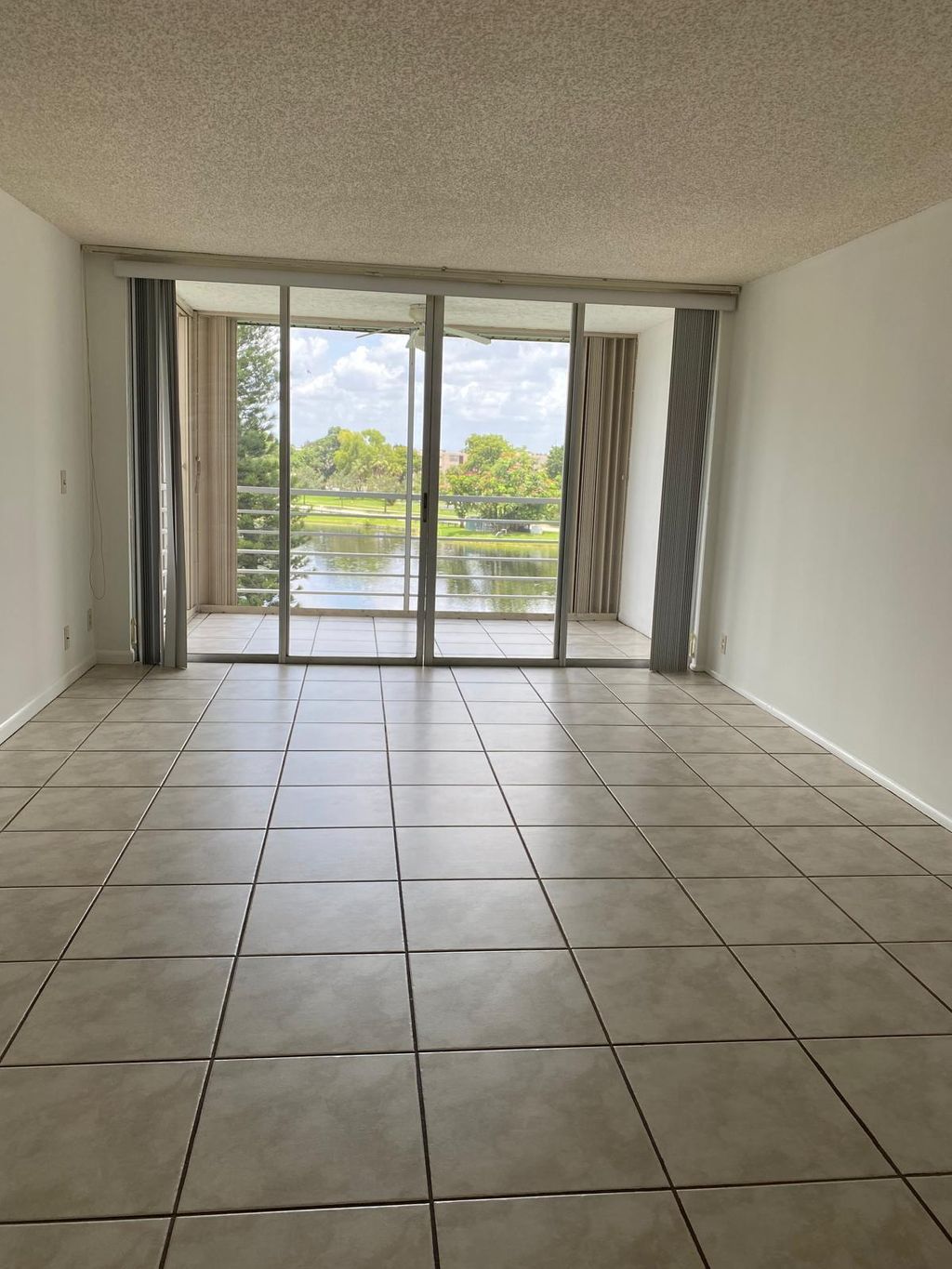 Photo of 9440 Poinciana Place #404, Davie, FL 33324 (MLS # B26028281)