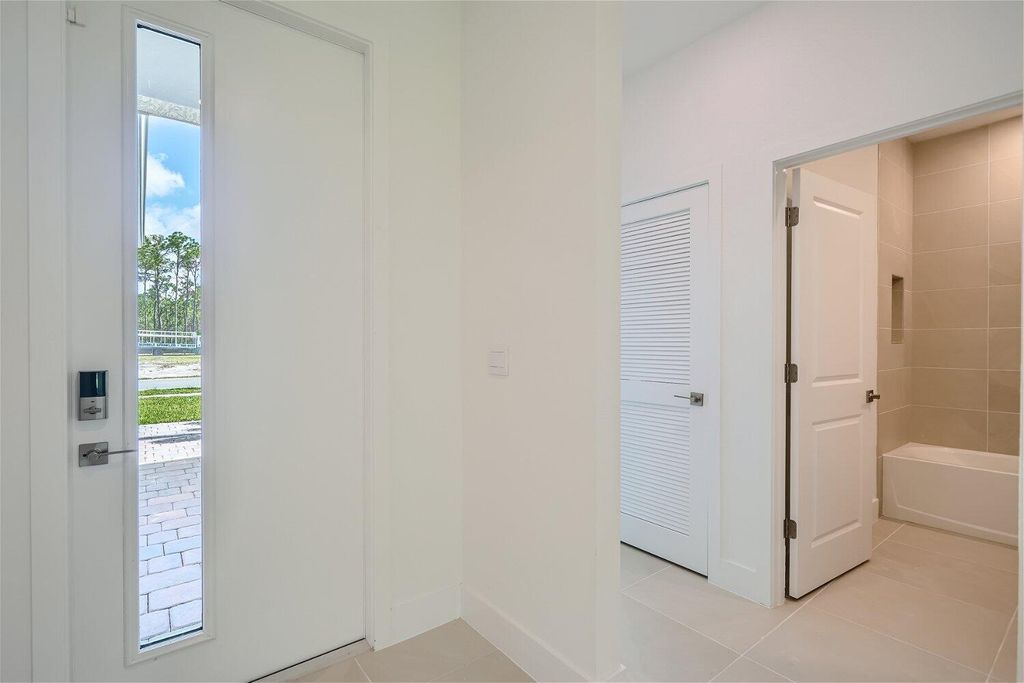 Photo of 6671 SE Park Trace Drive, Stuart, FL 34997 (MLS # R10958493)