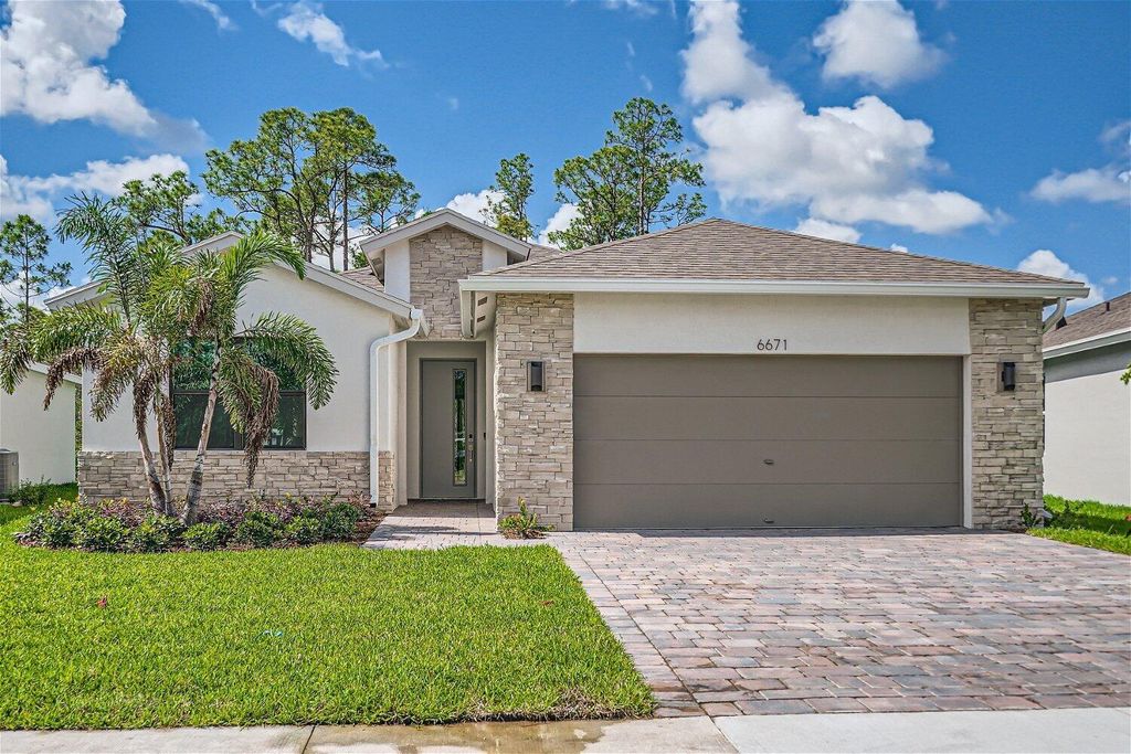 Photo of 6671 SE Park Trace Drive, Stuart, FL 34997 (MLS # R10958493)