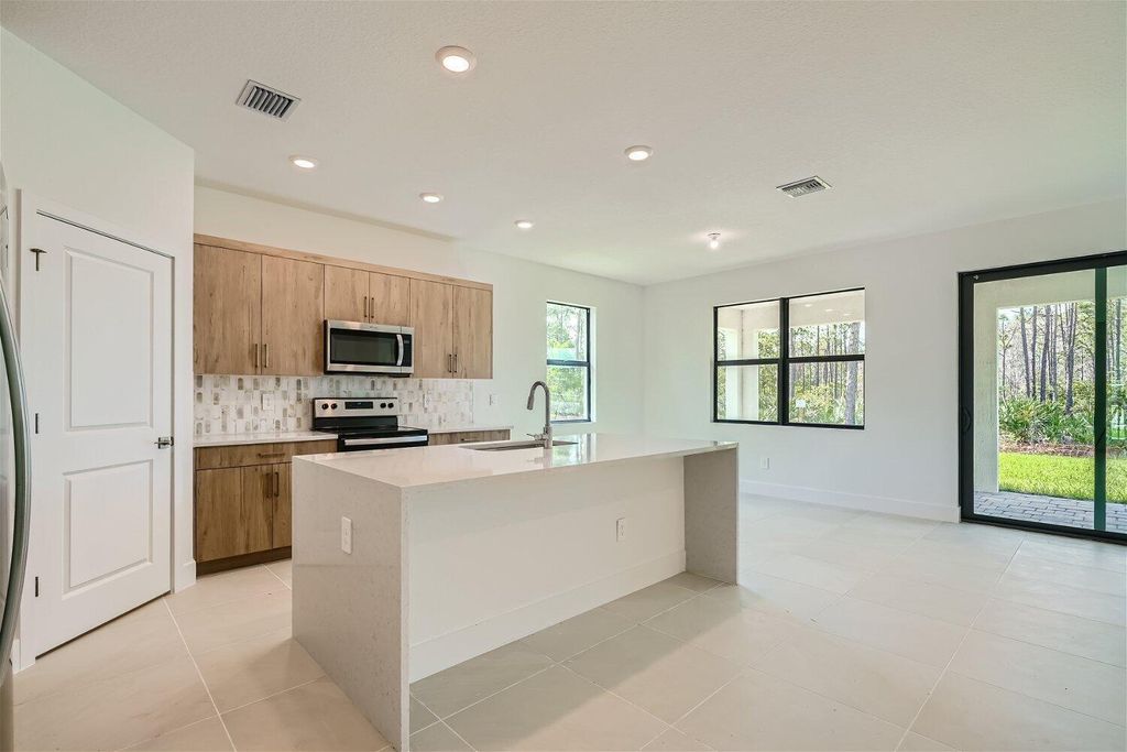 Photo of 6671 SE Park Trace Drive, Stuart, FL 34997 (MLS # R10958493)