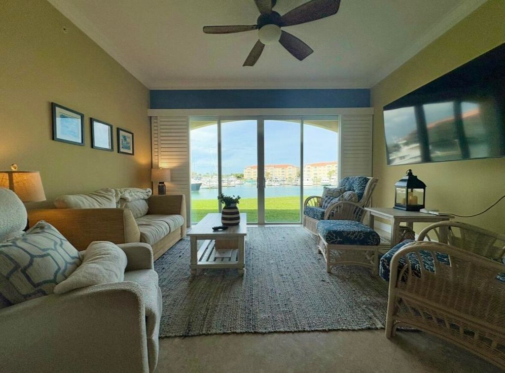 Photo of 14 W Harbour Isle Dr Drive W #106, Fort Pierce, FL 34949 (MLS # B26024436)