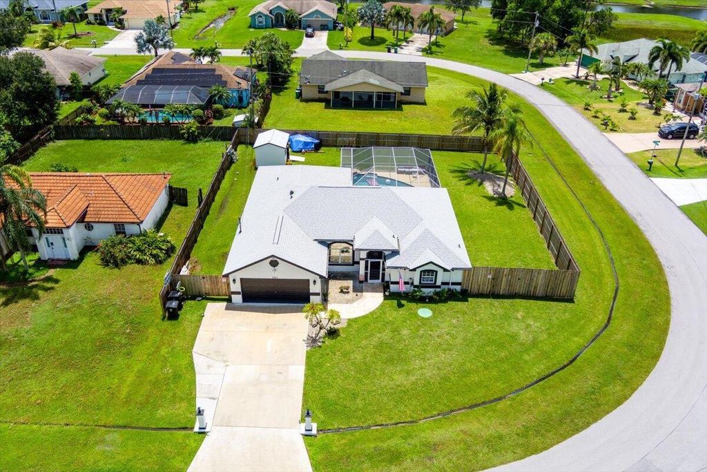 Photo of 5427 NW Consumer Avenue, Port Saint Lucie, FL 34983 (MLS # R11011167)