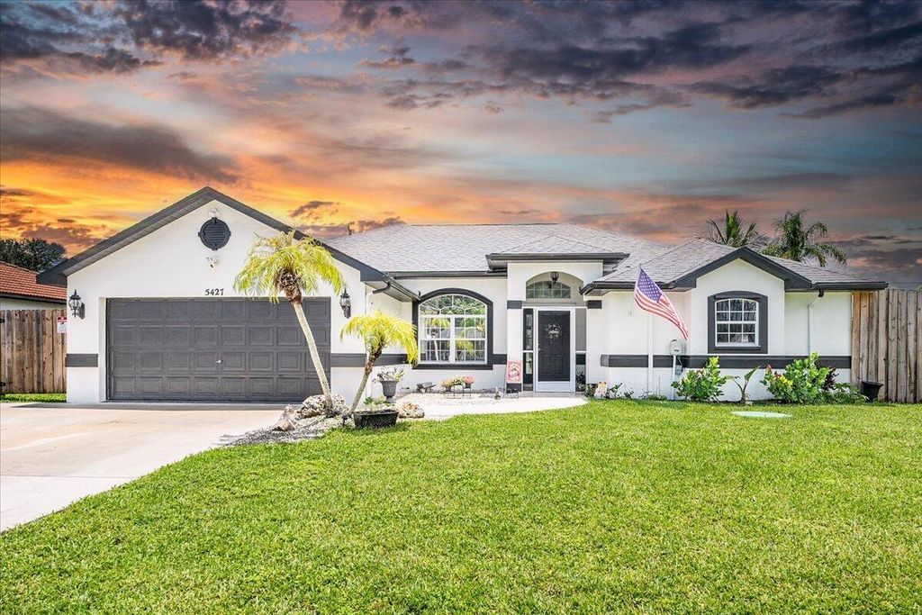 Photo of 5427 NW Consumer Avenue, Port Saint Lucie, FL 34983 (MLS # R11011167)