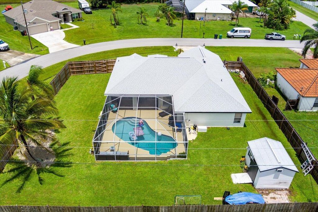 Photo of 5427 NW Consumer Avenue, Port Saint Lucie, FL 34983 (MLS # R11011167)