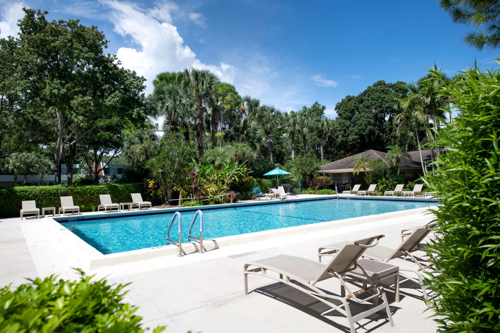 Photo of 806 Cypress Grove Lane #511, Pompano Beach, FL 33069 (MLS # B26085486)