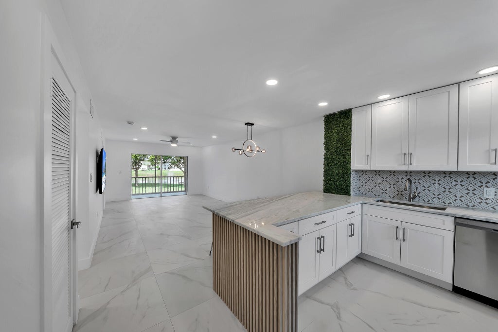 Photo of 9818 Marina Boulevard #1225, Boca Raton, FL 33428 (MLS # B26078886)