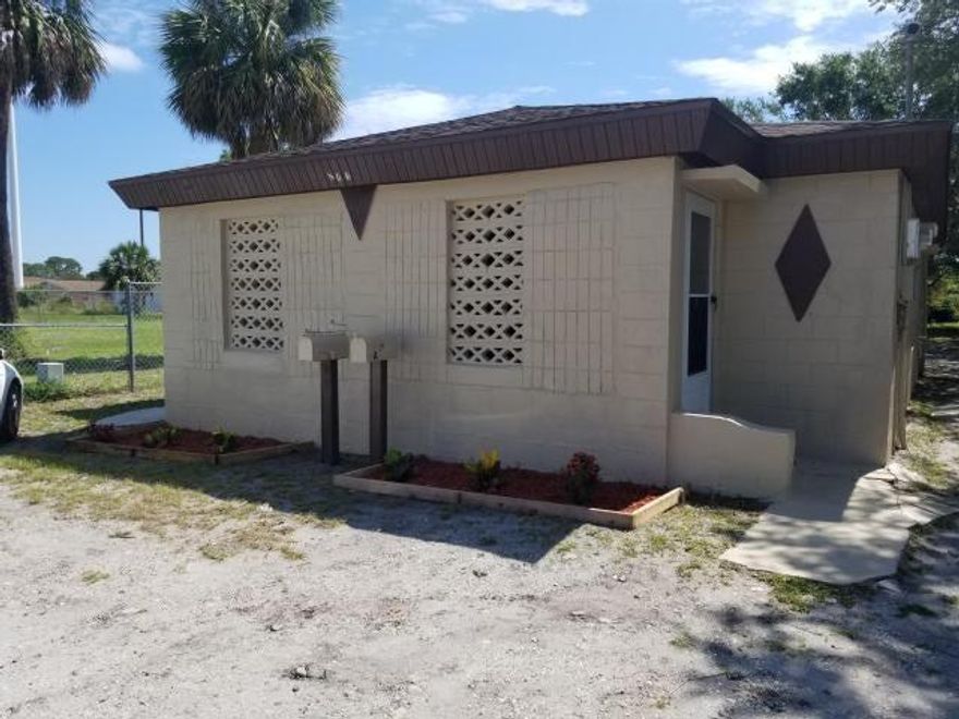 Newly remodeled 2/1 with tile main area laminate in bedrooms, 2 window AC units in bedrooms. Must see!