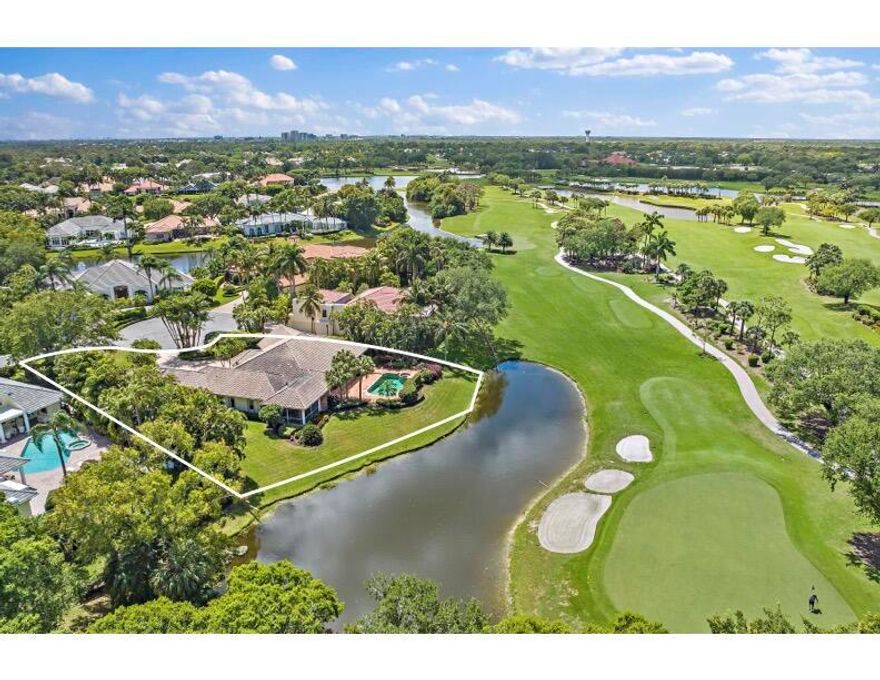 FIRST TIME ON THE MARKET! Enjoy the gorgeous and serene views from this private location with water and golf views. This 3 bed 3.1 bath home is located within the gates of Frenchman's Creek Beach and Country Club, offering its residents a one of a kind and spectacular lifestyle. Renovate the current home or build your own masterpiece on this oversized .6 acre lot with approximately 180 feet of lake frontage overlooking the 13th green.