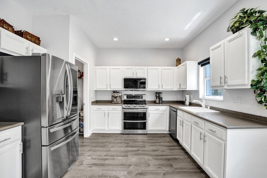 Photo of 12648 NW 8th Court, Coral Springs, FL 33071 (MLS # B26016410)