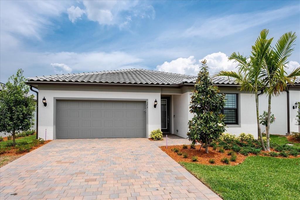 BRAND NEW OPEN CONCEPT HOME! TURNKEY READY. IMMACULATE 3/2 BUILT WITH HIGH CEILINGS AND NEW ROOF, CROWN MOLDING AND CUSTOM MADE FRONT DOOR. NEW STAINLESS STEEL APPLIANCES, NEW FLOORING, NEW A/C, NEW IMPACT WINDOWS, NEW 42 INCH KITCHEN CABINETRY WITH QUARTZ COUNTERTOPS, UPGRADED FULL HIS AND HERS CALIFORNIA WALK IN MASTER CLOSET. UPDATED BATHROOMS WITH CABINETRY AND NEW SHOWERS. DRIVEWAY FITS 4 CARS + 2 CAR GARAGE WITH NEW EPOXY GARAGE FLOOR. HOME SITS ON A PRESERVE(SELLERS PAID $40k FOR PRESERVE LOT). OPEN COVERED PATIO/LANAI. AMPLE SIZED BACKYARD FOR POOL, PETS, PERGOLA, FAMILY, ENTERTAINMENT. CENTRALLY LOCATED WITH PUBLIX SHOPPING PLAZA AND TURNPIKE 5 MINS AWAY. 20 MINUTE DRIVE TO THE BEACH. QUICK ACCESS TO C-24 CANAL OPEN ACCESS BOAT RAMP PARK. BRAND NEW AMENITIES/CLUBHOUSE.