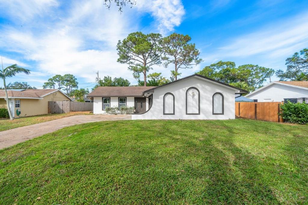 This Beautiful home located in the desirable Biltmore Estates.  No HOA, bring your boat!!!  BRAND New Roof and Hurricane impact windows. Stainless steel applicances, kitchen opened to large family room. Vinyl wood Floor thru-out and an extra large 2 car garage, Master bedroom room has 2 closets with glass shower enclosure in masterbath and many more features. Zoned for A+++ schools, near all major shops and dining. Great neighborhood.