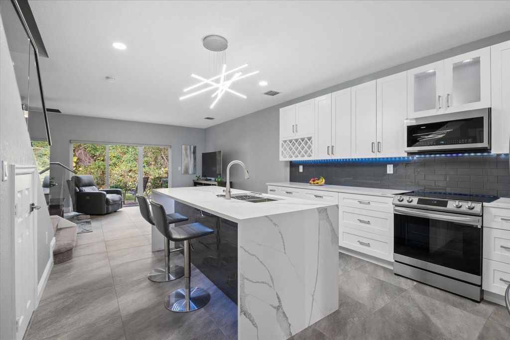 Photo of 2507 NW 31st Court #2507, Oakland Park, FL 33309 (MLS # F10554322)