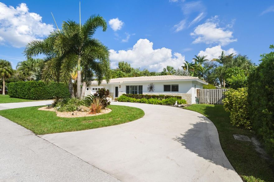 Back on the market with no fault of the seller. Priced to sell. Live the Florida lifestyle in this beautifully updated Lighthouse Point home! Featuring an open, airy layout with modern finishes, this home is move-in ready with an updated kitchen (2023), both bathrooms (2025),  2021 HVAC, 2024 impact windows/doors, and a 2026 refinished pool with new glass tile and Diamond Brite. Enjoy 3 spacious bedrooms with spacious closets + a versatile 4th bedroom (converted garage, easily reverted to 1-car garage ). The lush landscaping and backyard with a covered patio are designed for effortless and comfortable entertaining, gardening, and space for play. Located near the marina, dining, and shopping, you are just minutes from the sand! Buyer Agents welcome.