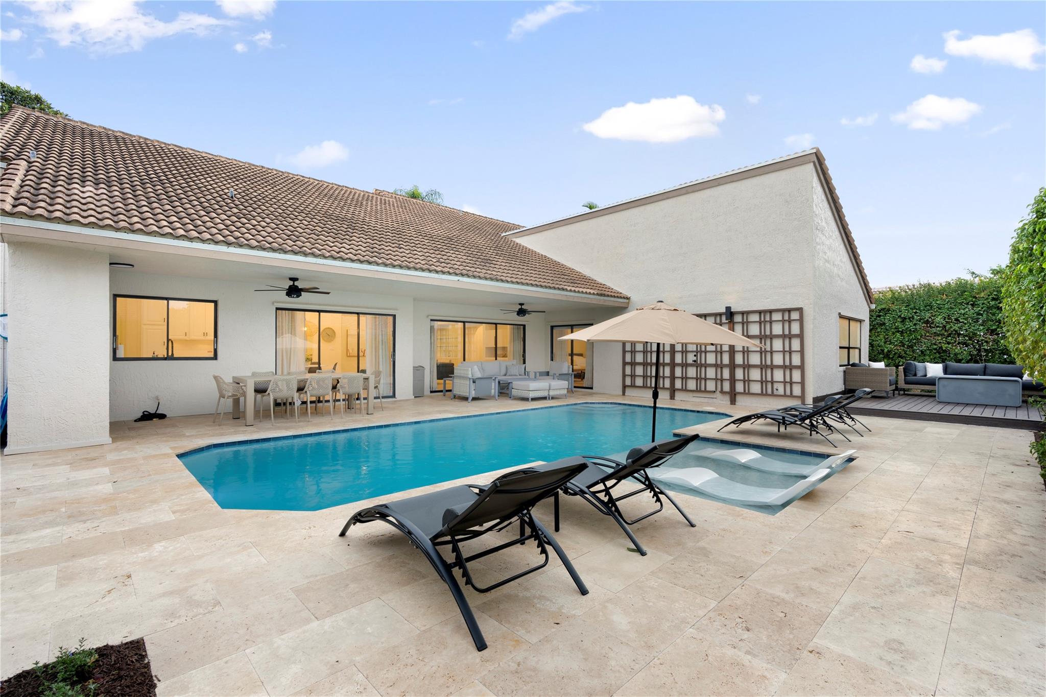 Welcome home to this updated 4 bedroom, 2.5 bathroom, heated pool home with a newly renovated backyard for hosting. "A" rated school district. This home boasts a fully fenced, private backyard with a heated pool, patio, circular driveway and plenty of room for entertaining friends and family. This home is in a beautiful community with quick access to major roads, place of worship, all things shopping, dining and more. Furniture can be included. No HOA.