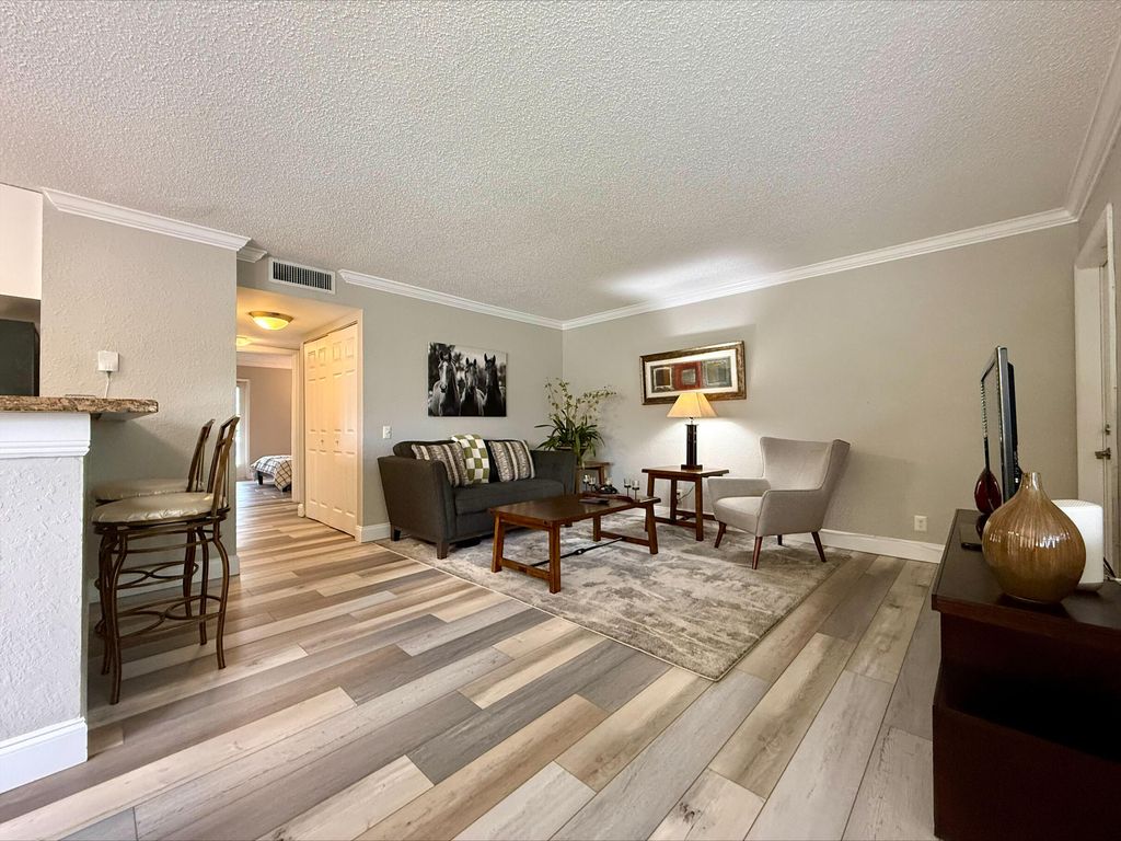 Photo of 711 Forest Club Drive #111, Wellington, FL 33414 (MLS # B26021188)