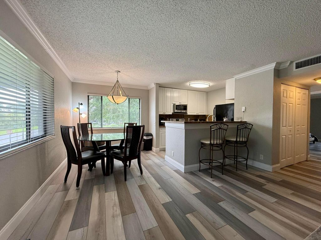 Photo of 711 Forest Club Drive #111, Wellington, FL 33414 (MLS # B26021188)