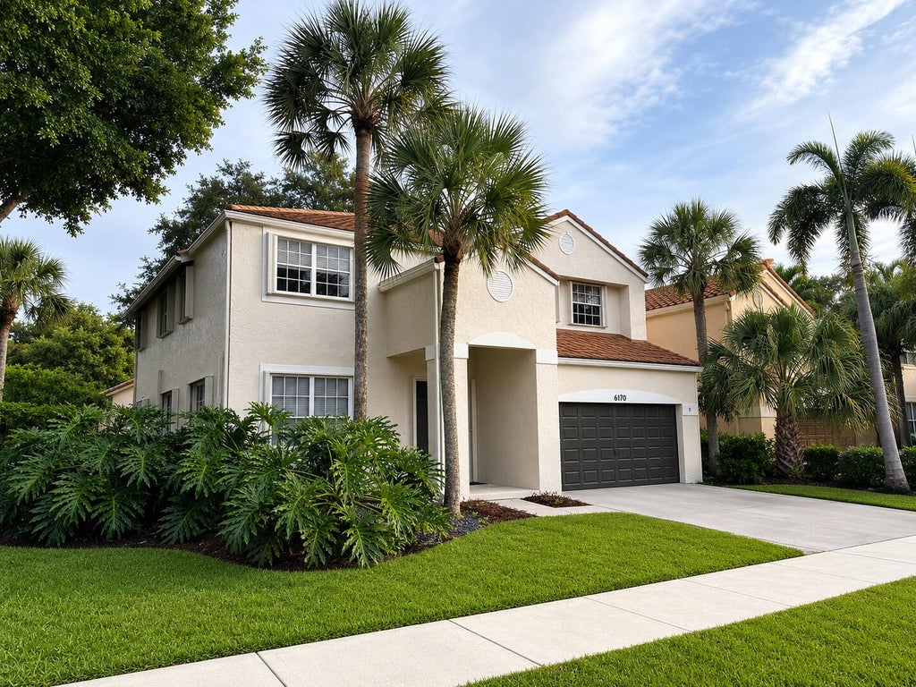 Photo of 6170 NW 77th Place N, Parkland, FL 33067 (MLS # B26038112)