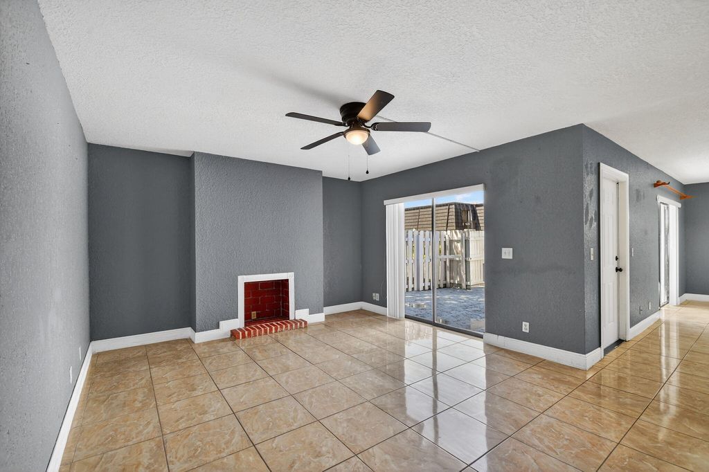 Photo of 320 Woodland Road, Palm Springs, FL 33461 (MLS # B26008562)