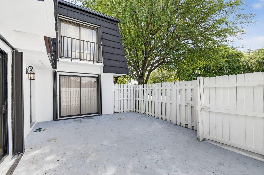 Photo of 320 Woodland Road, Palm Springs, FL 33461 (MLS # B26008562)