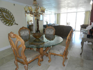 Beautiful fully upgraded Penthouse suite, sitting on the ninth floor with must see views of the Atlantic Ocean throughout the home. The kitchen is upgraded with mahogany cupboards, stainless steel appliances and granite countertops. This penthouse offers a spacious open floor plan of dining/ living room and has the ability of being a 2/2. Master bedroom has a spacious walk-in closet and as well as multiple closets leading to the On-suite master bathroom with a spa tub. Barclay Building has 24 hour security provided by a doorman, a wonderful fitness center and not to mention a cabana area near the pool that offers a grilling station. Spa services are only steps away from the property at Eau de Palm Beach, formerly known as the Ritz Carlton.