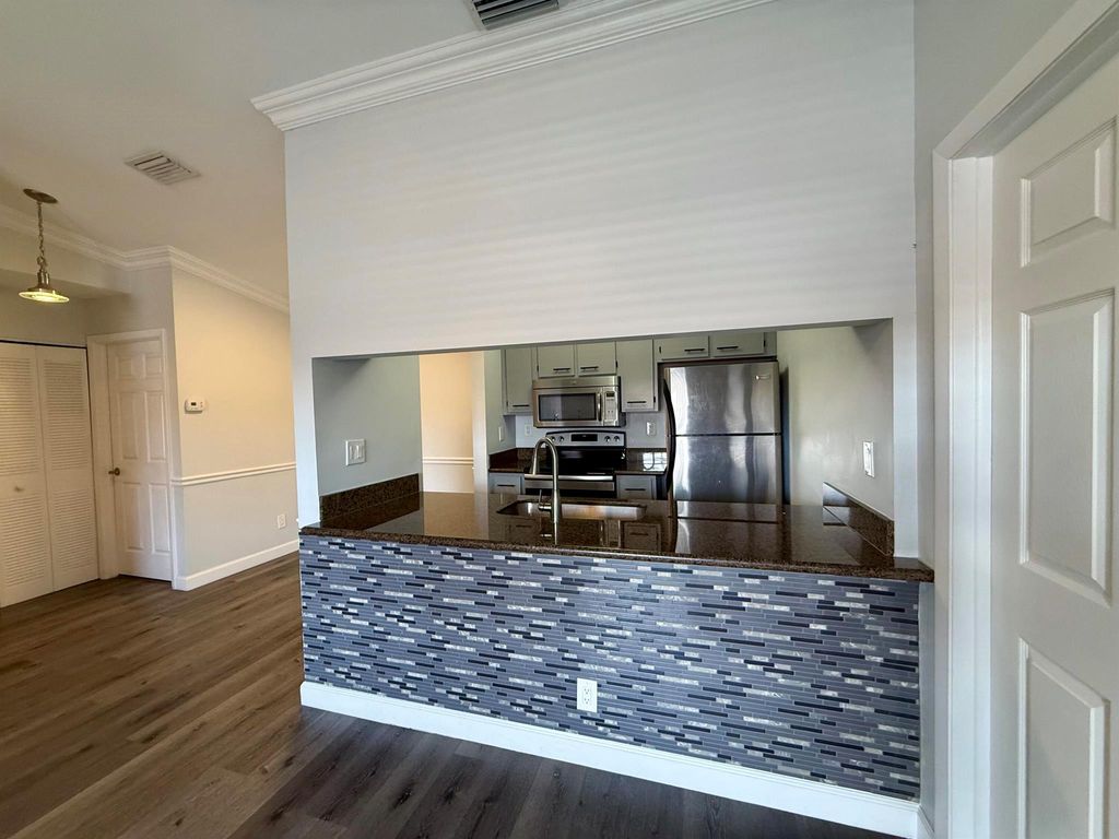 Photo of 9466 Boca Cove Circle #312, Boca Raton, FL 33428 (MLS # R11093369)