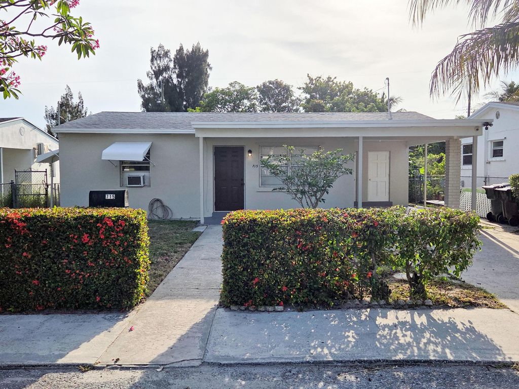 Photo of 715 S C Street, Lake Worth, FL 33460 (MLS # B26040702)