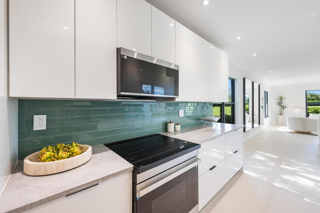 Photo of 800 Greensward Court #107-I, Delray Beach, FL 33445 (MLS # R11168990)