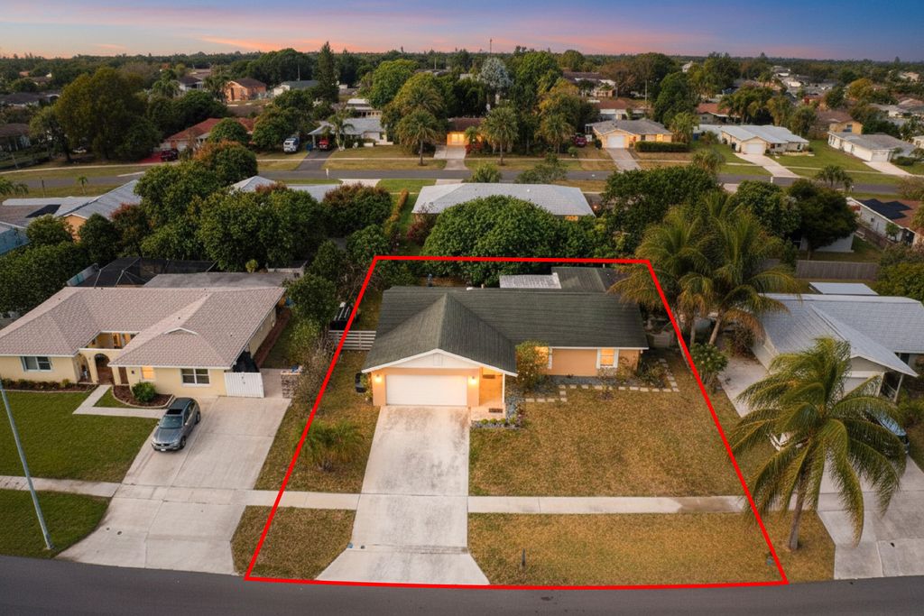 Photo of 849 Camellia Drive, Royal Palm Beach, FL 33411 (MLS # R11168678)