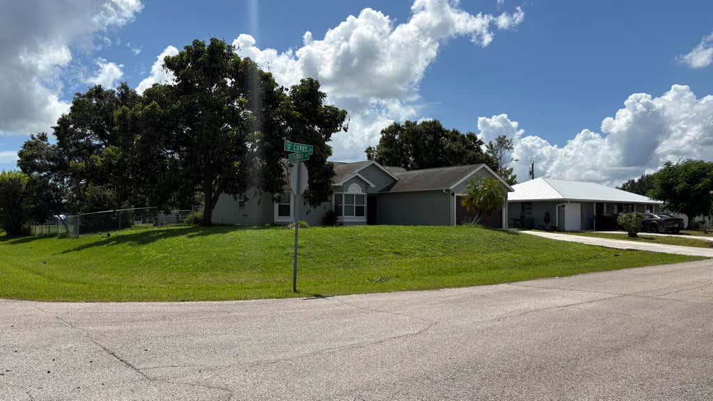 Photo of 1501 SW CURRY Street, Port Saint Lucie, FL 34983 (MLS # B26063994)