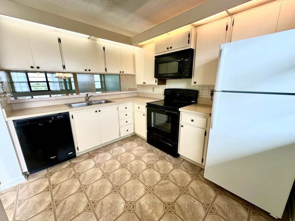 Photo of 3507 Village Boulevard #405, West Palm Beach, FL 33409 (MLS # R10958271)