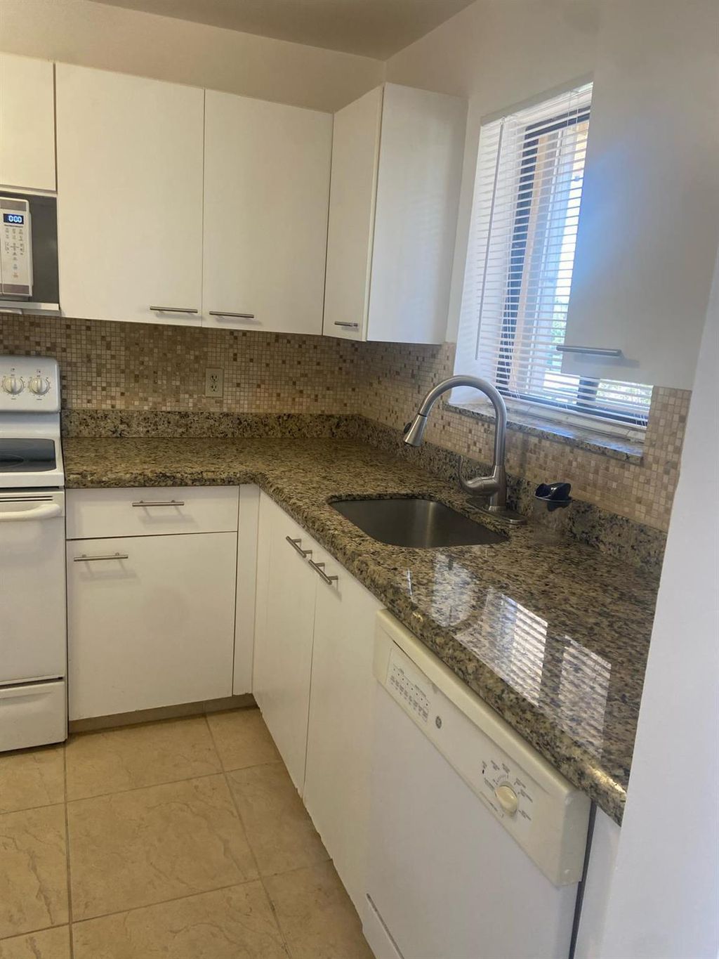 Photo of 4820 Lucerne Lakes Boulevard #205, Lake Worth, FL 33467 (MLS # R11094073)