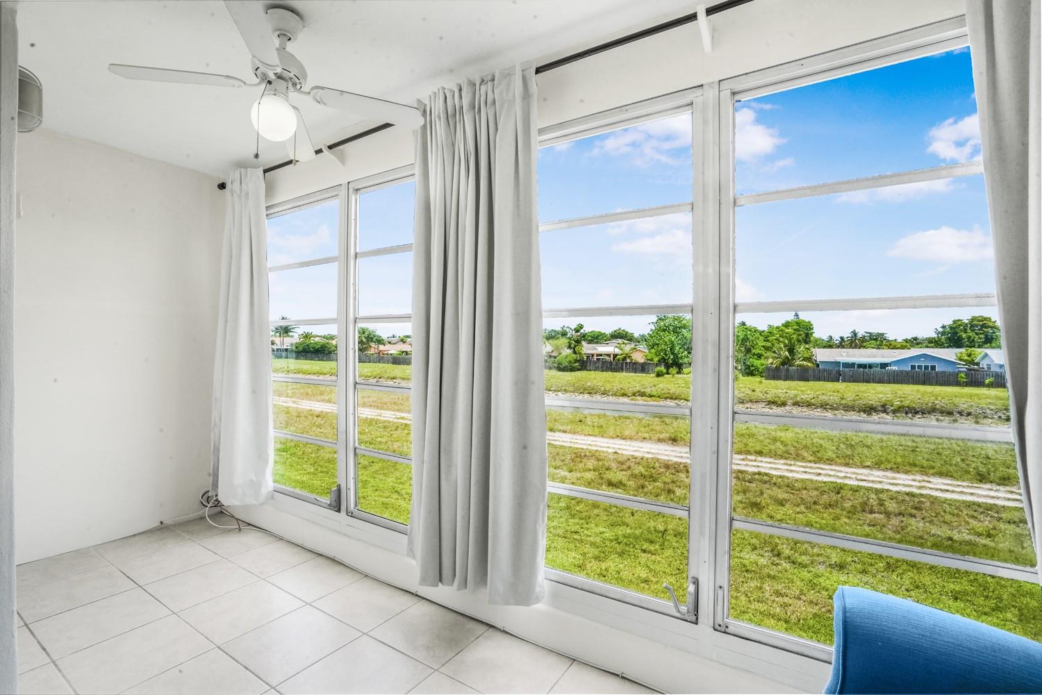 Discover this charming 1 bed, 1 bath home in Sunrise Lakes Phase 2. Enjoy serene canal views from the enclosed patio, perfect for relaxing or entertaining. The updated kitchen and bathroom add modern appeal, while tile flooring throughout offers easy maintenance and a sleek look. This lovely residence combines comfort and style in a vibrant community. Don’t miss your chance to make this beautiful home your own—schedule a visit today!