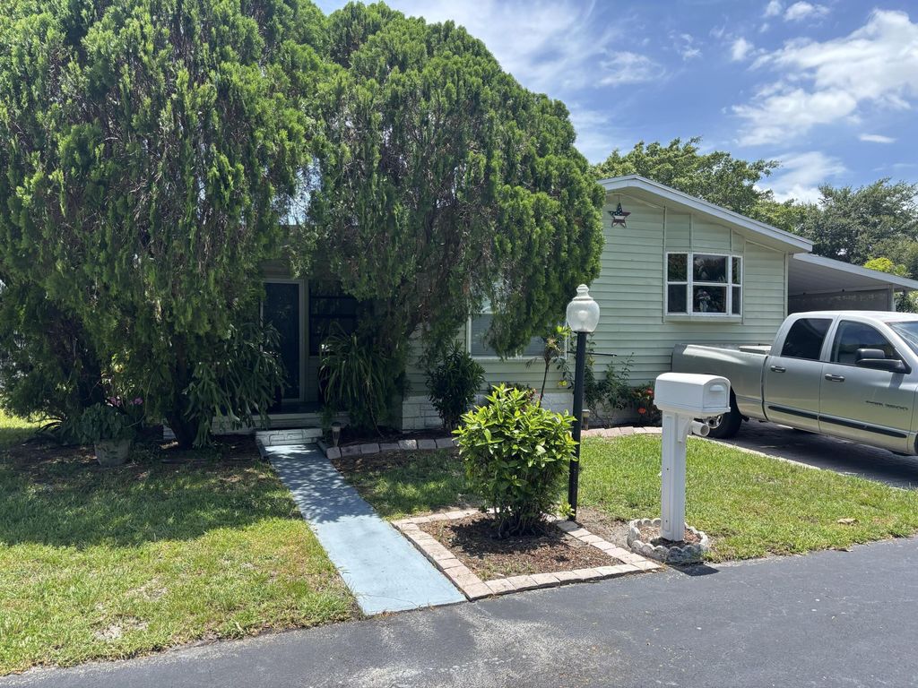 Photo of 4520 NW 68th Place, Coconut Creek, FL 33073 (MLS # B26044599)