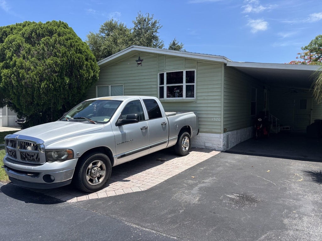 Photo of 4520 NW 68th Place, Coconut Creek, FL 33073 (MLS # B26044599)