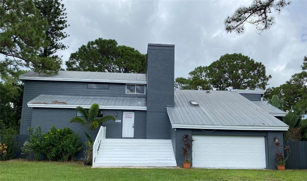 Photo of 6945 150th Place, Palm Beach Gardens, FL 33418 (MLS # F10500704)