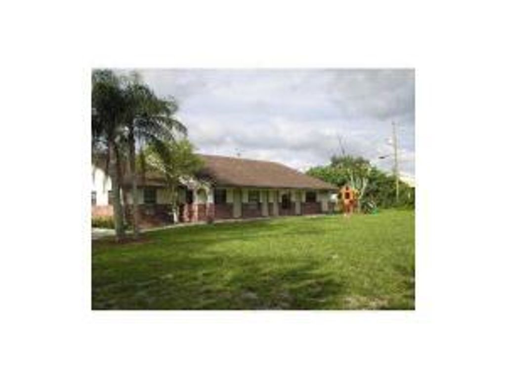Photo of 5600 NW 76 Th Place Coconut Greek Place, Coconut Creek, FL 33073 (MLS # R10795070)